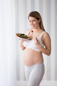 Woman Eating for Two